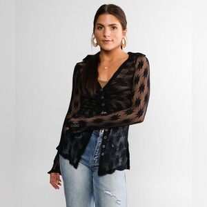 Flower Fields Mesh Top
FREE PEOPLE